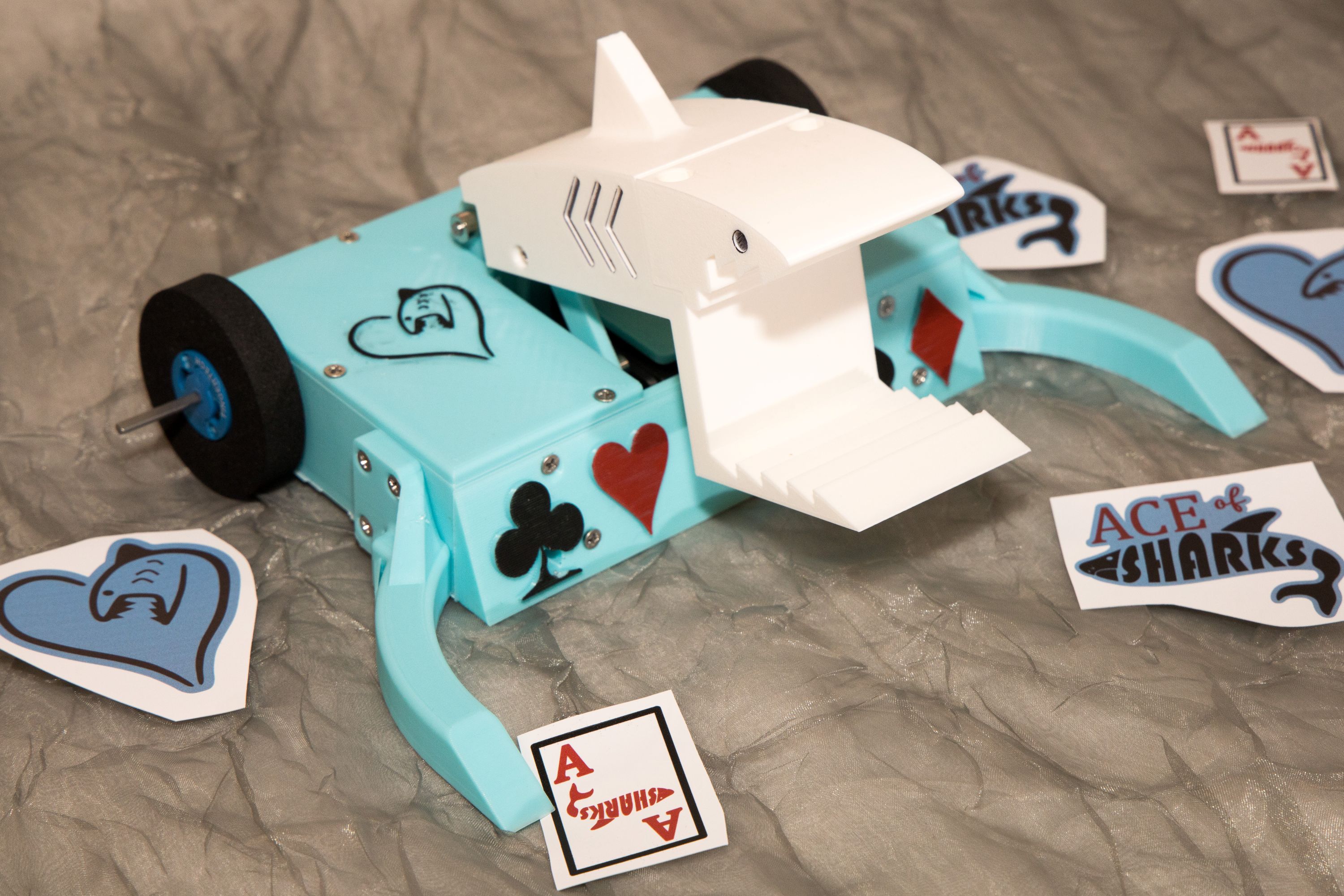 Shark themed combat robot with a lifter arm to try to lift other
            robots into the air